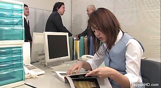 Japanese babe gets fucked in the office